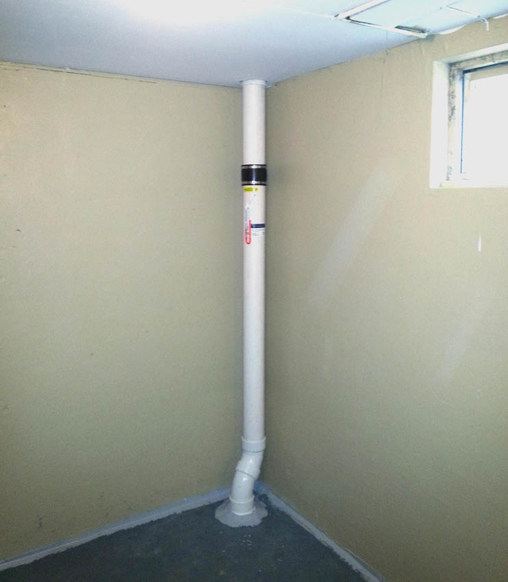 Examples of what a Sub Slab Depressurization Radon Mitigation Systems by Absolute Radon Safety look like on the interior of the home.